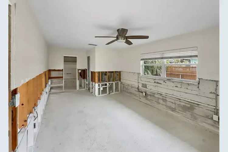Investor's Dream: 4-Bed, 2-Bath Home Ready for Renovation