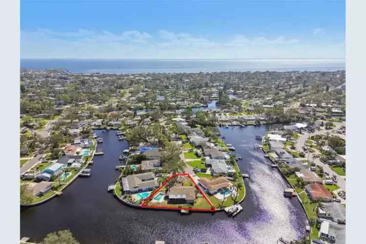 Waterfront 4-Bedroom Home with Oversized Garage and Screened Balcony