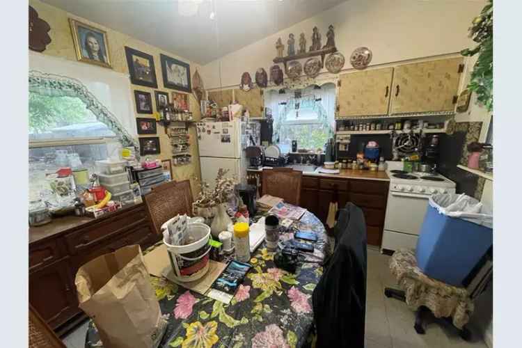 Floral Village Investment Opportunity: 2 Bed 1 Bath Home