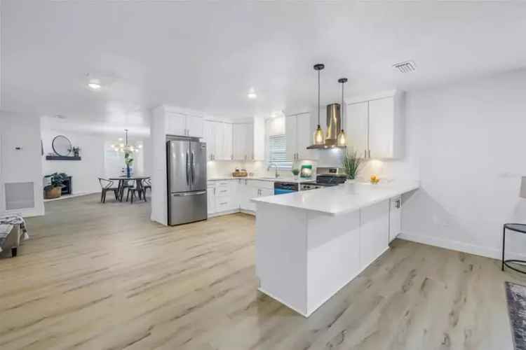 3 Bed 2 Bath Remodeled Home with 9000 Sqft Lot and Impact Windows