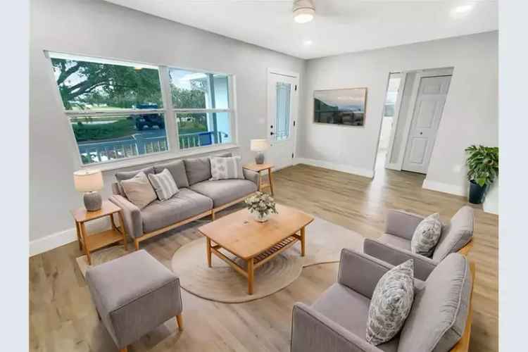 Beautifully Renovated Home with Modern Kitchen and Backyard Oasis