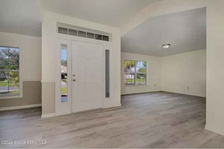 Fully Remodeled Concrete Block Home with Numerous Fruit Trees