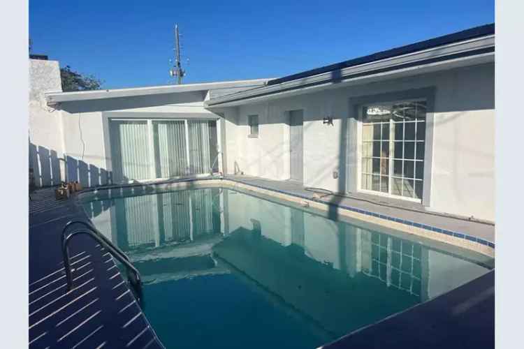 4 Bedroom 3 Bathroom Pool Home in Riviera Bay