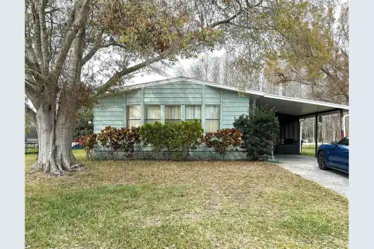 Affordable 2-Bed 2-Bath Home with Workshop and Screened Room
