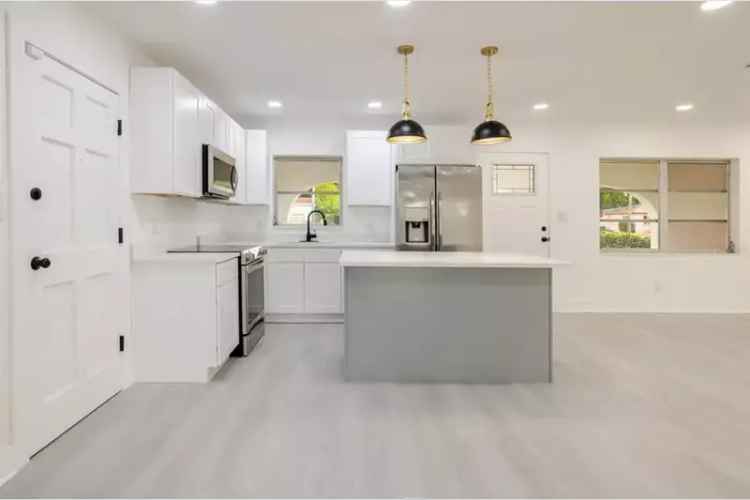 Enchanting 4-Bedroom Home with Modern Kitchen and Beautiful Yard