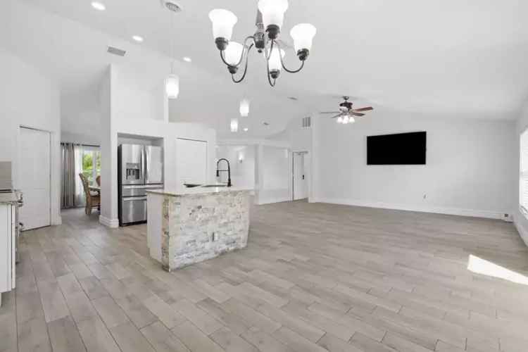Updated Home with Vaulted Ceilings, New Roof, Hurricane Shutters