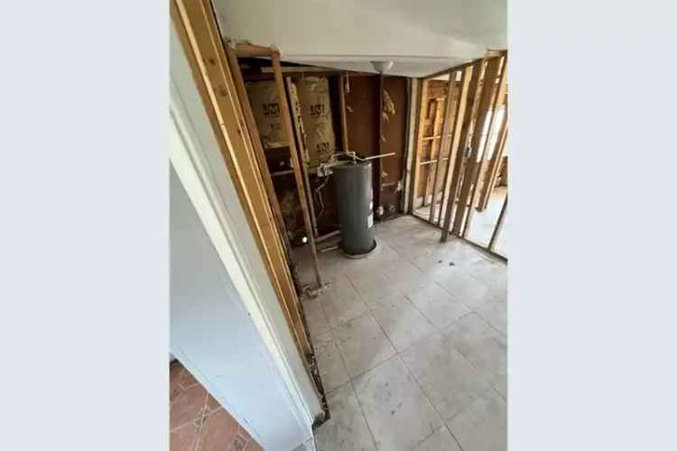 Fixer-Upper Property Needs Repairs Flood Damaged