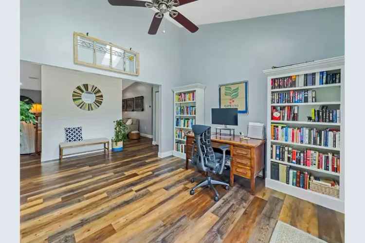 3-Bedroom Coastal Home with Shiplap Fireplace and Screened Porch