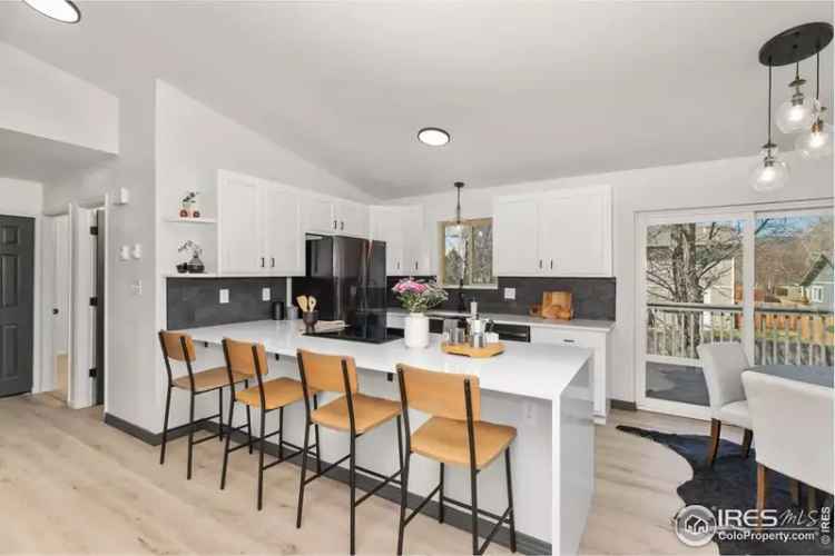 Midtown Fort Collins Home: Chef's Kitchen, Fireplace, Primary Suite