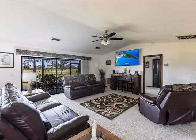 Golf Course View Brick Home with Open Concept Layout