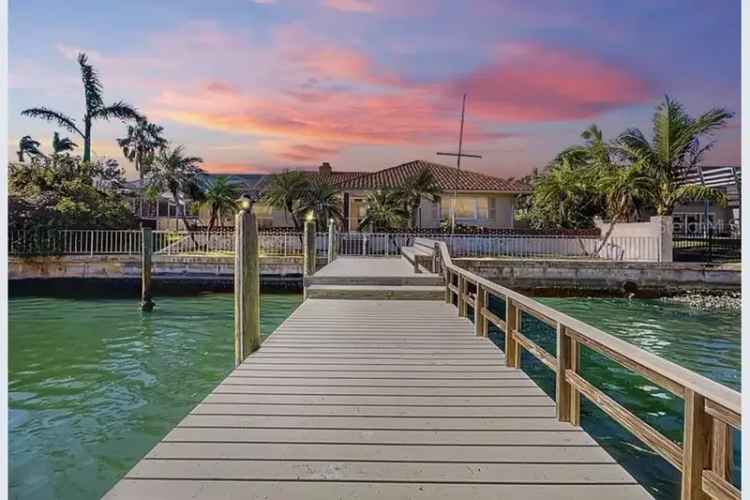 3 Bed 4 Bath Waterfront Home in Bayway Isles - Full Remodel Awaits