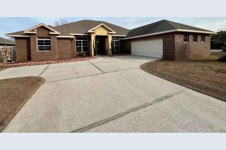 Four-Bedroom Waterfront Home in Gated Community
