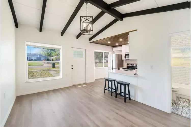 Updated 1-Bed, 2-Bath Home with Oversized Garage Near 4th Street