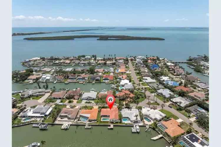 Waterfront Home in Bayway Isles - Prime Location with Huge Potential