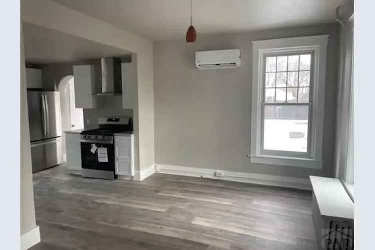 Updated 2-Story Home with Modern Conveniences and Park Views
