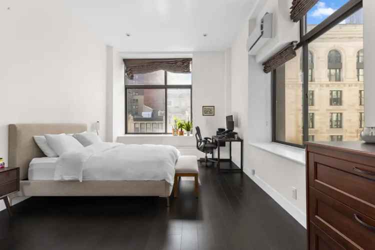 Luxury High-Rise Condo with Soaring Ceilings and City Views