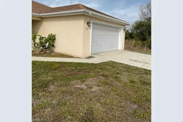 Updated 3 Bedroom Home with Screened Lanai and 2 Car Garage