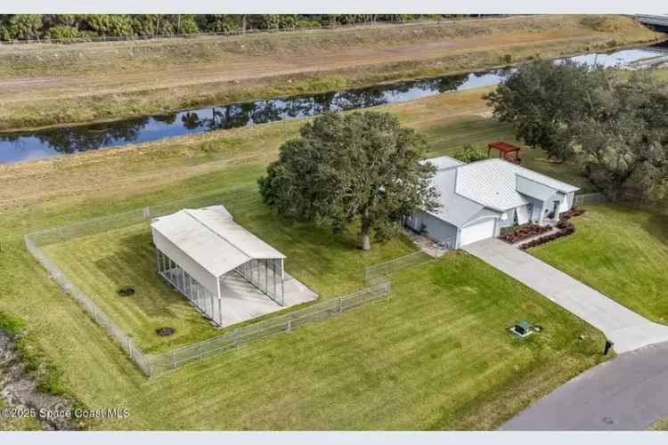 Stunning Upgraded Home on Canal Lot with Outdoor Oasis