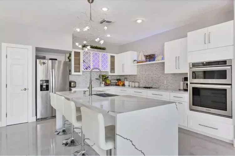 6-Bedroom Waterfront Home with Private Pool and Tennis Court