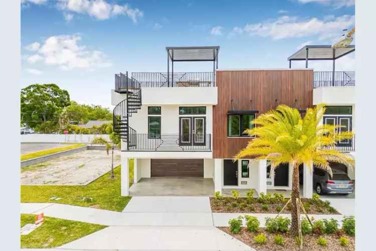 Luxury Townhome with 4-Car Garage and Rooftop Terrace