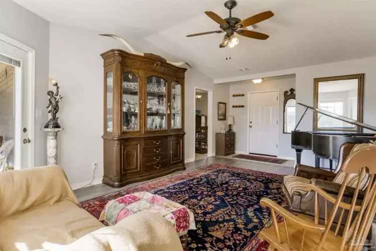 Move in Ready Home on Half Acre Lot with Converted Garage