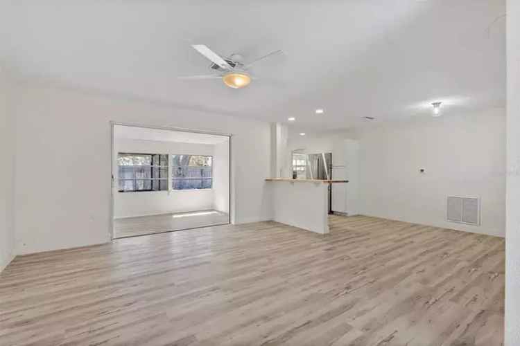Updated 2 Bed 1.5 Bath Home with Enclosed Family Room and Shed