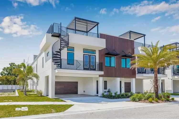 Luxury Townhome with 4-Car Garage and Rooftop Terrace