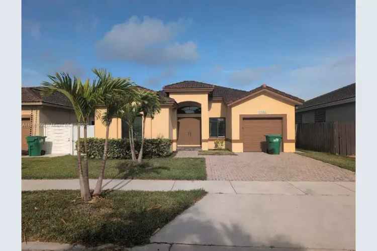 3-Bedroom Ranch Home with Spacious Living Areas and Backyard