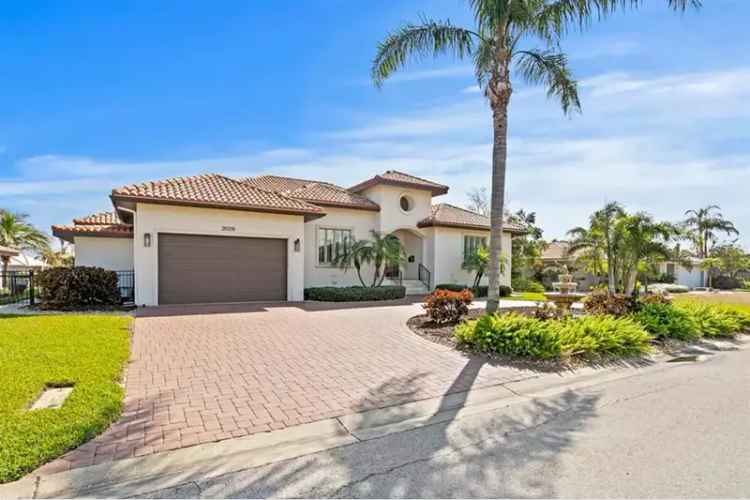 Waterfront Retreat in Venetian Isles: Modern Mediterranean Home with Pool and Boat Lifts