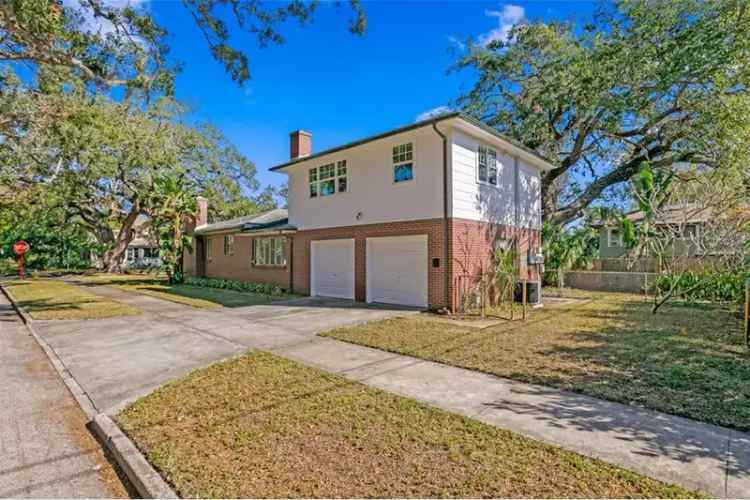 Charming 1950s Brick Home with Garage Apartment in Euclid St Pauls
