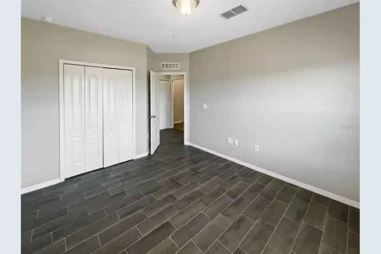 Spacious Primary Bedroom with Walk-in Closet and Double Sinks
