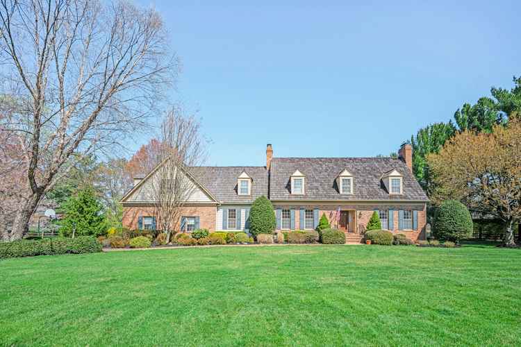 Custom Brick Colonial on 2 Acres with Pool and Court